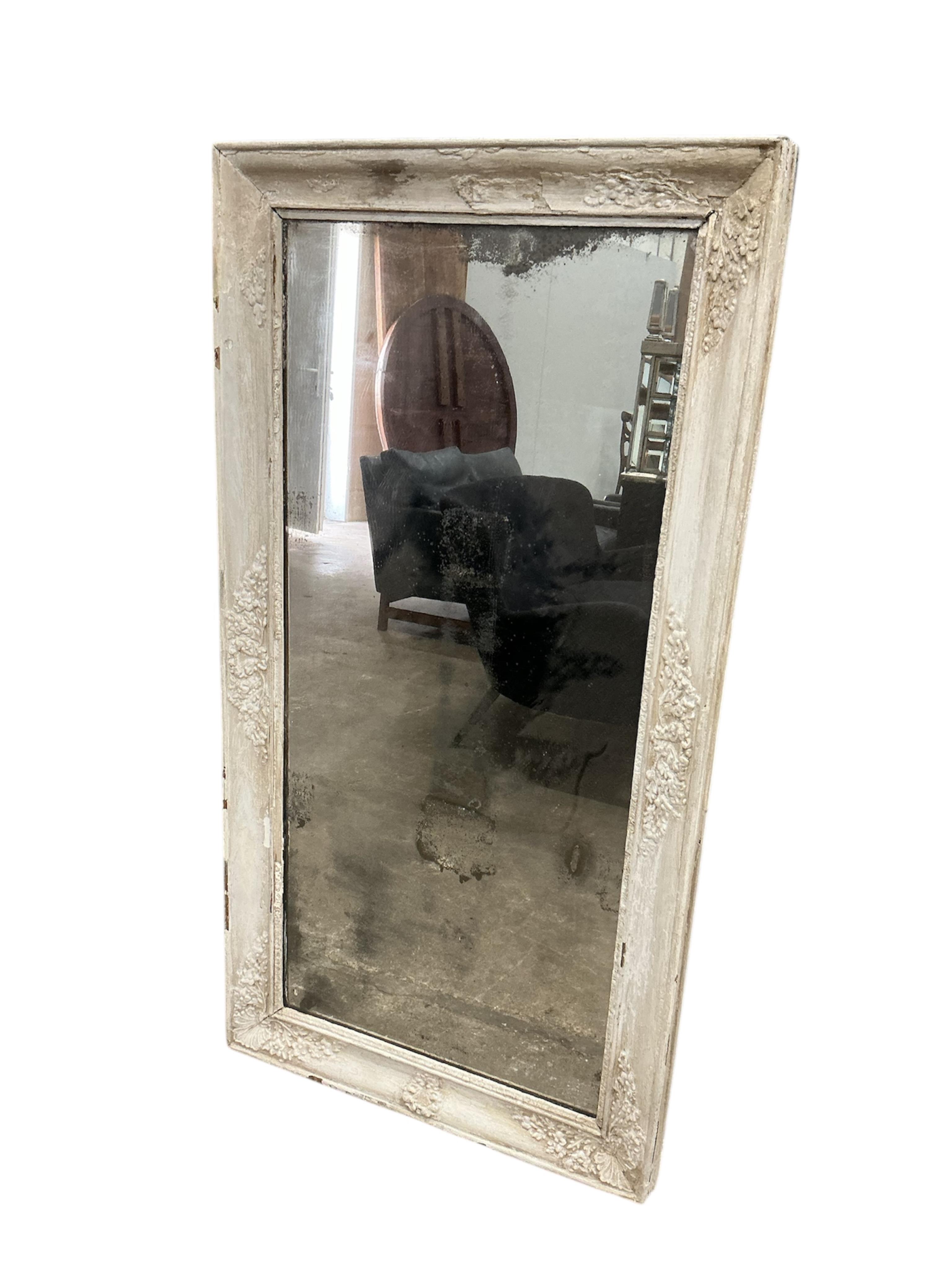 A Victorian rectangular painted wood and composition wall mirror, width 65cm, height 125cm